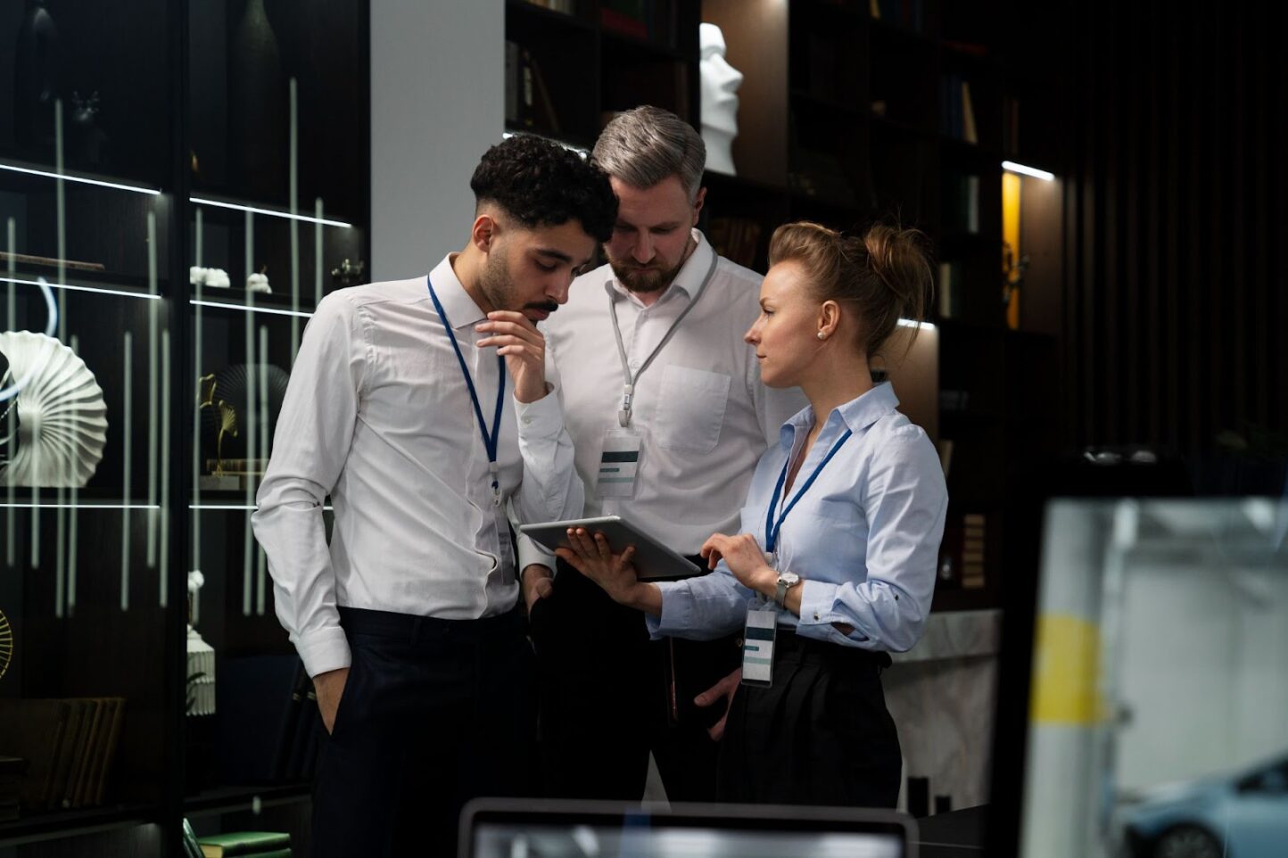 Group of people working together at office and discussing project